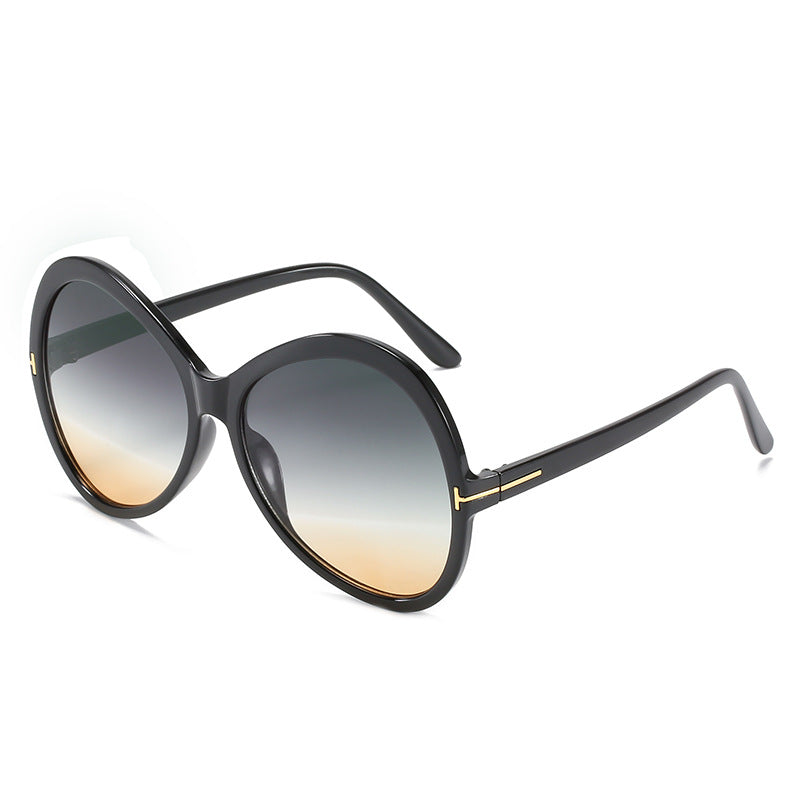 A pair of trendy big frame sunglasses showcasing a unique personality style, perfect for fashion enthusiasts.