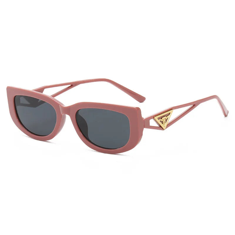 A pair of trendy Small Frame Cat Eye Sunglasses from Sexikinis Swim, showcasing a stylish design perfect for summer fashion.