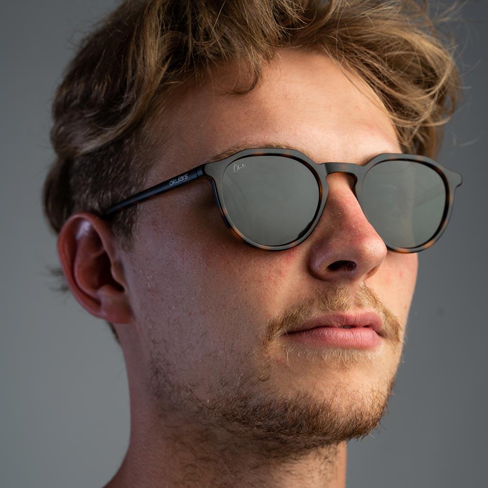 Okulars Eco Pacific Kelp sunglasses made from recycled materials, featuring a matte finish and UV400 protection.
