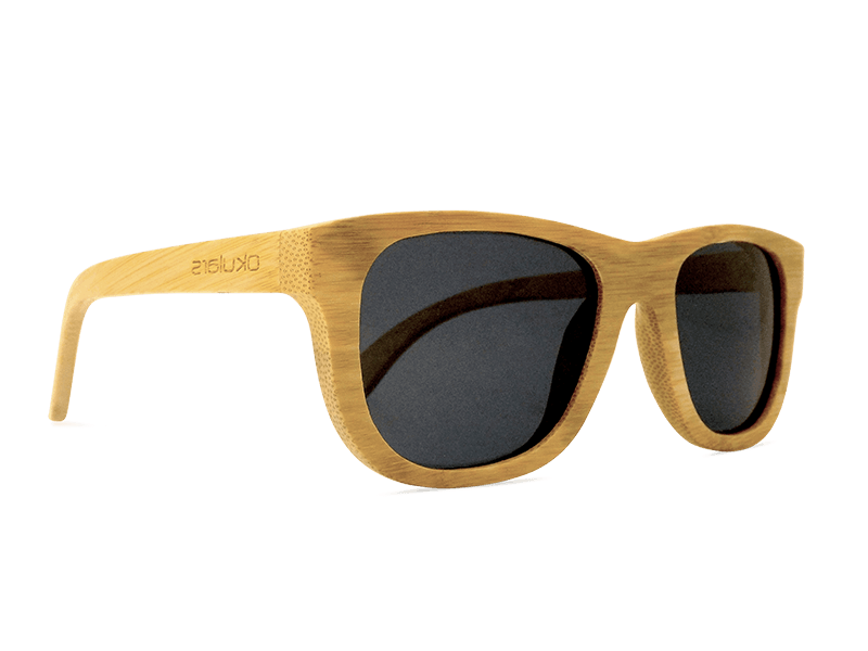 Okulars® Natural Bamboo sunglasses in Coal Black, featuring a lightweight bamboo frame and polarized lenses, displayed elegantly.