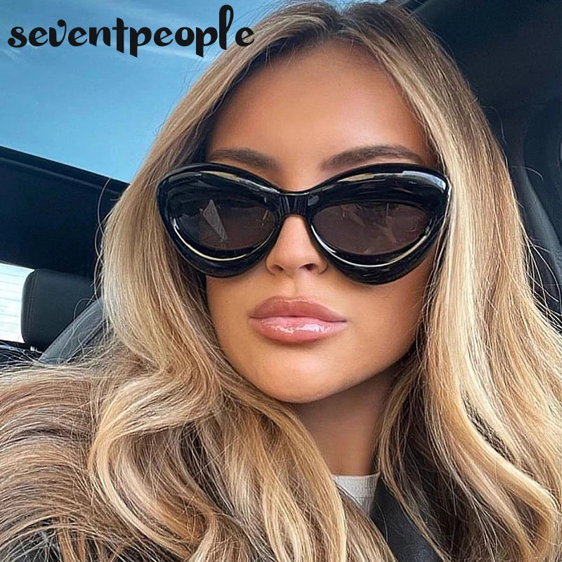 Plush women Cat Eye Sunglasses featuring a unique lip-shaped design and durable polycarbonate frame, perfect for stylish sun protection.