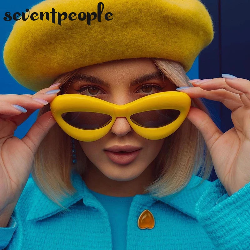 Plush women Cat Eye Sunglasses featuring a unique lip-shaped design and durable polycarbonate frame, perfect for stylish sun protection.