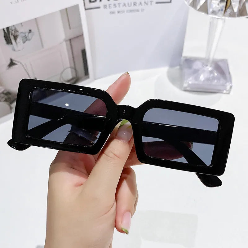 Small Frame Rectangle Sunglasses by FANHUN, featuring a stylish design and UV400 protection, perfect for women.
