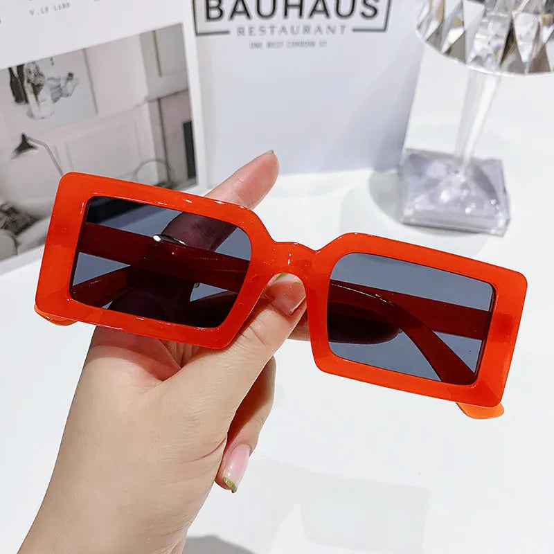 Small Frame Rectangle Sunglasses by FANHUN, featuring a stylish design and UV400 protection, perfect for women.