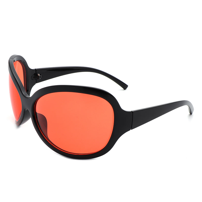 A pair of oversized oval sunglasses in a stylish Y2K design, featuring a wrap-around frame for comfort and UV protection.