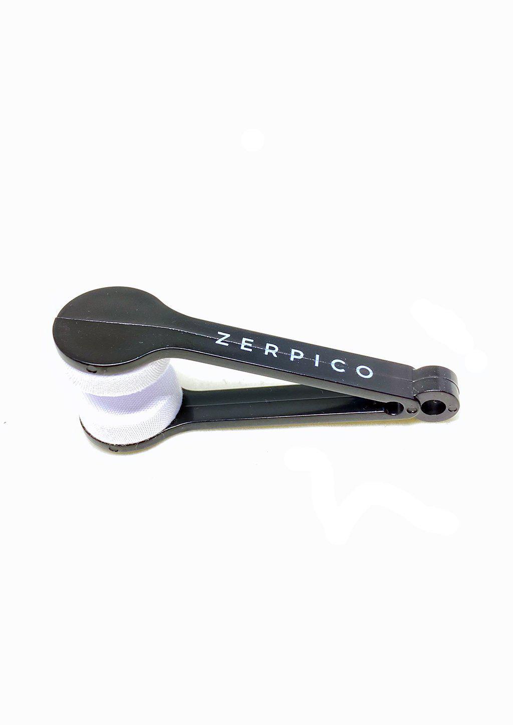 Zerpico Portable Glasses Cleaner with microfiber pads attached to a keychain, designed for easy cleaning of glasses and sunglasses.