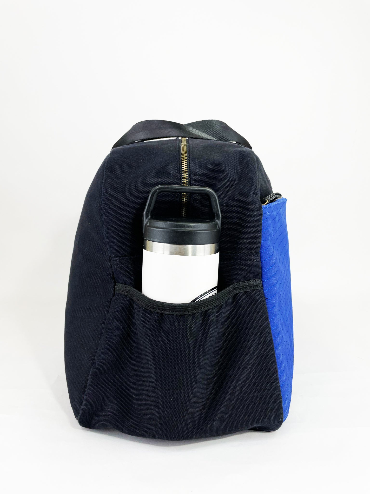 Getaway Duffel Bag in Sittin' Pretty Pink, featuring stylish design and multiple compartments for travel organization.