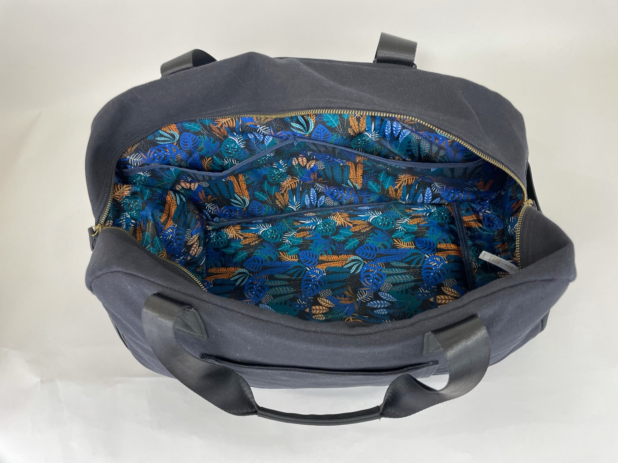 Getaway Duffel Bag in Sittin' Pretty Pink, featuring stylish design and multiple compartments for travel organization.