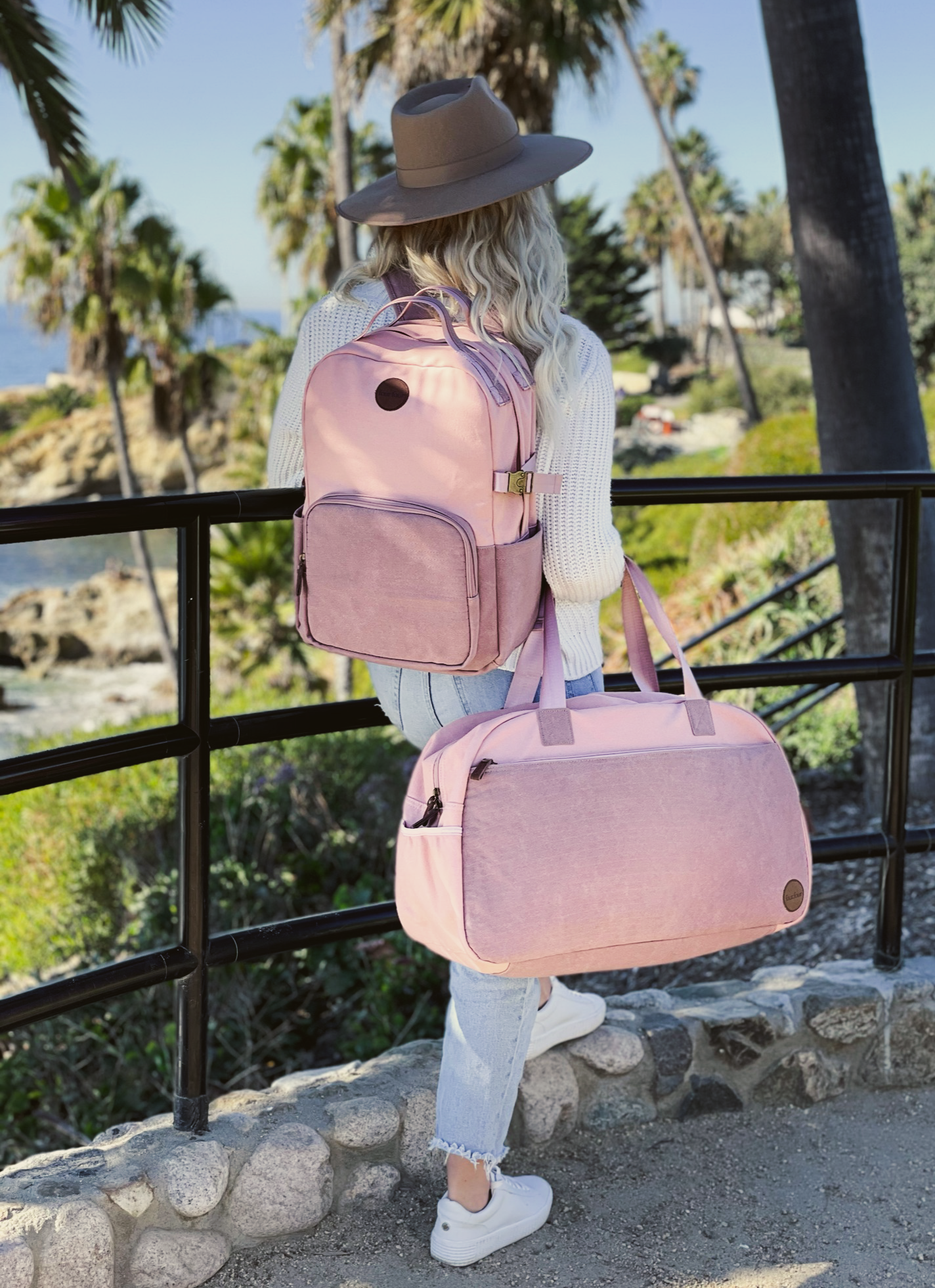 Getaway Duffel Bag in Sittin' Pretty Pink, featuring stylish design and multiple compartments for travel organization.
