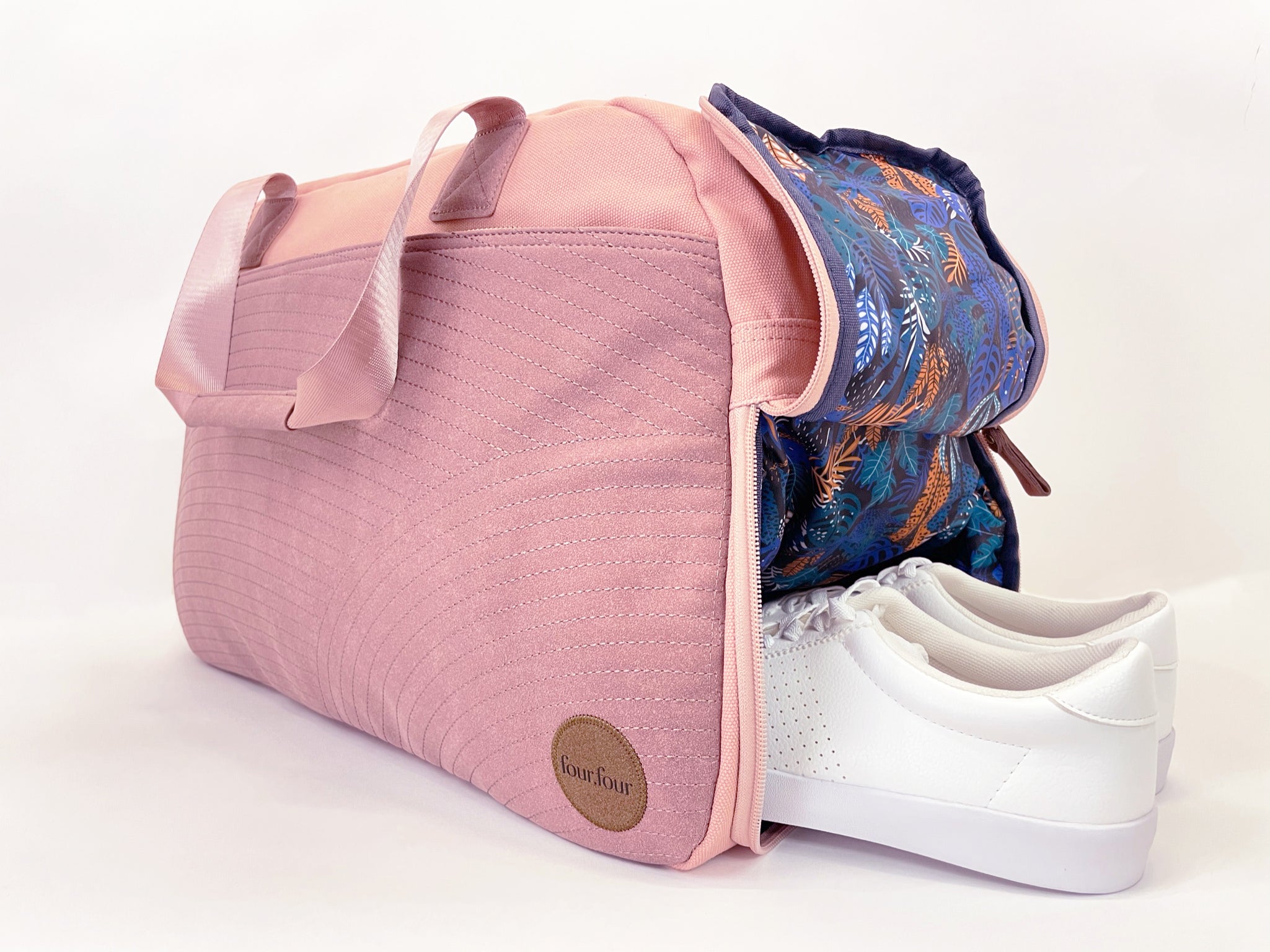 Getaway Duffel Bag in Sittin' Pretty Pink, featuring stylish design and multiple compartments for travel organization.