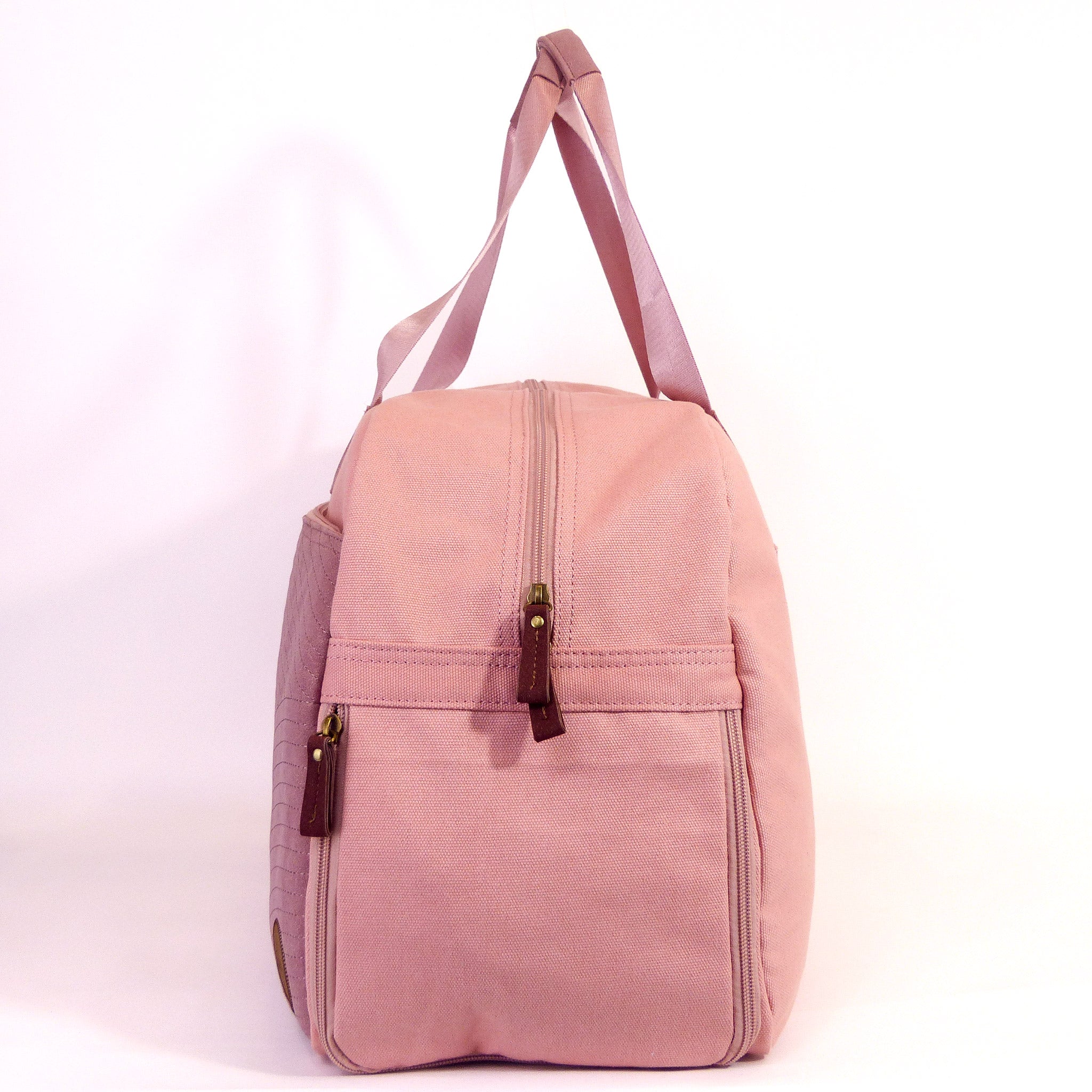 Getaway Duffel Bag in Sittin' Pretty Pink, featuring stylish design and multiple compartments for travel organization.