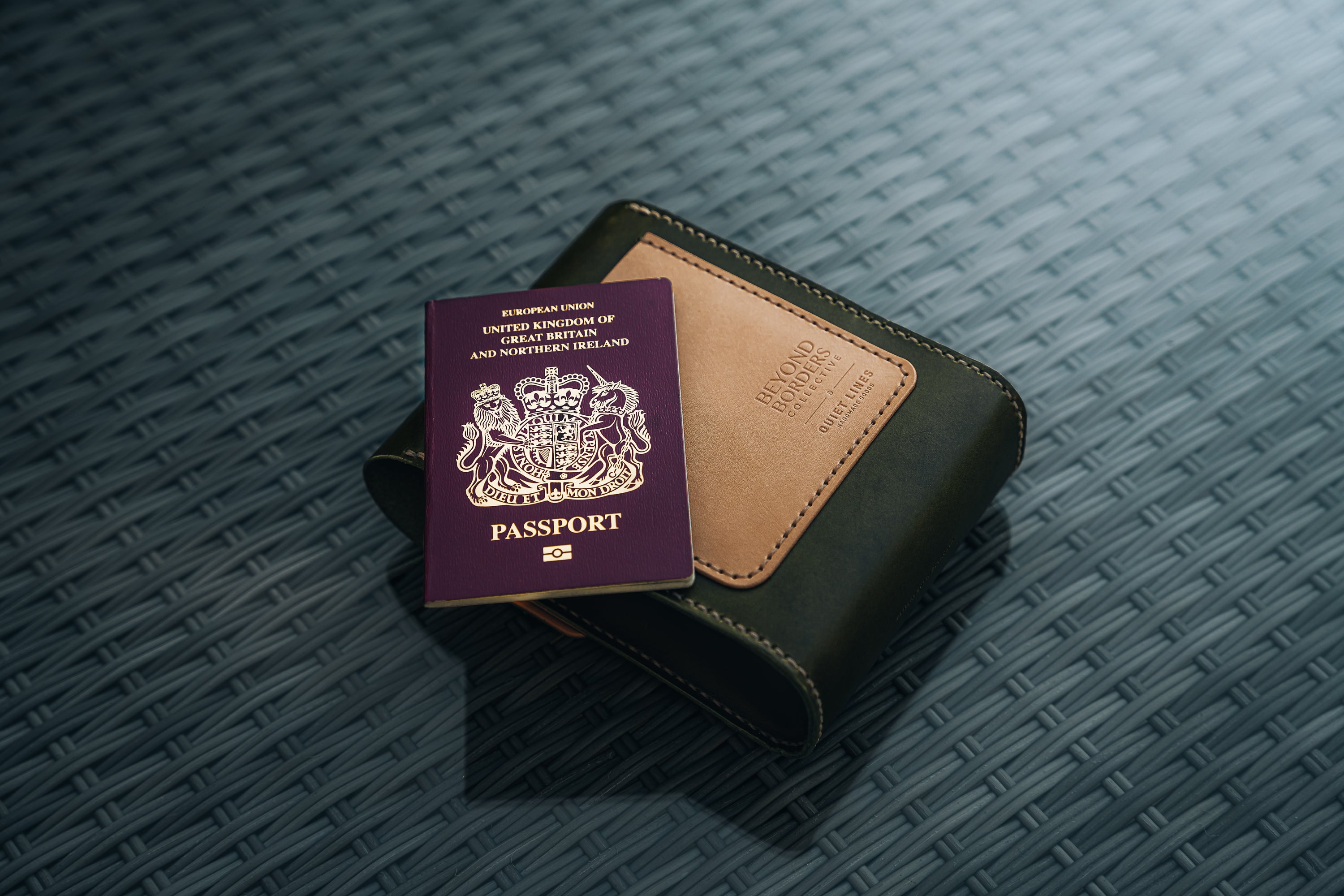 Giramondo Leather Crossbody Bag in Olive and Natural colors, showcasing full grain leather and matte black hardware.