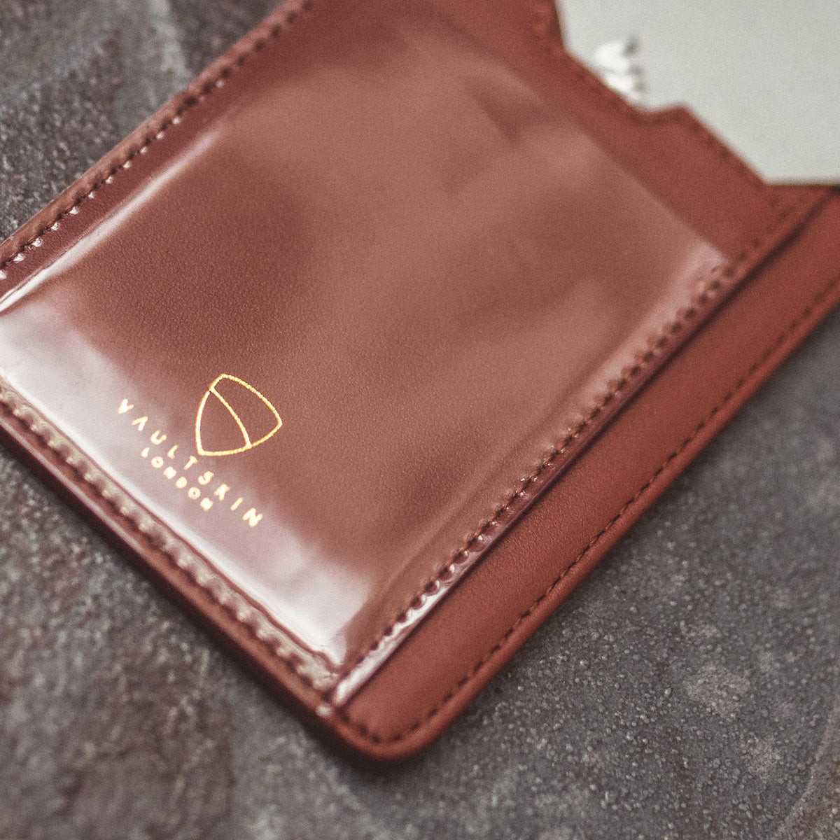 Vaultskin BRIXTON Slim Card Holder in genuine leather, showcasing its sleek design and multiple pockets.
