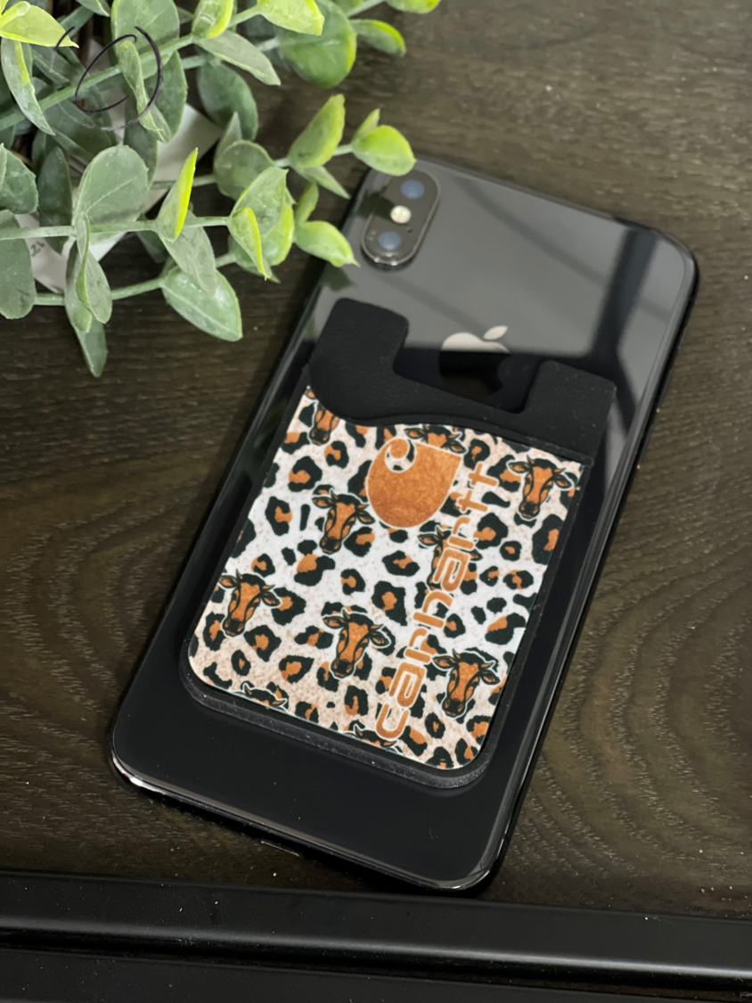 Bronze Leopard Carhartt Card Caddy Phone Wallet with microfiber screen cleaner attached, showcasing its stylish design and functionality.