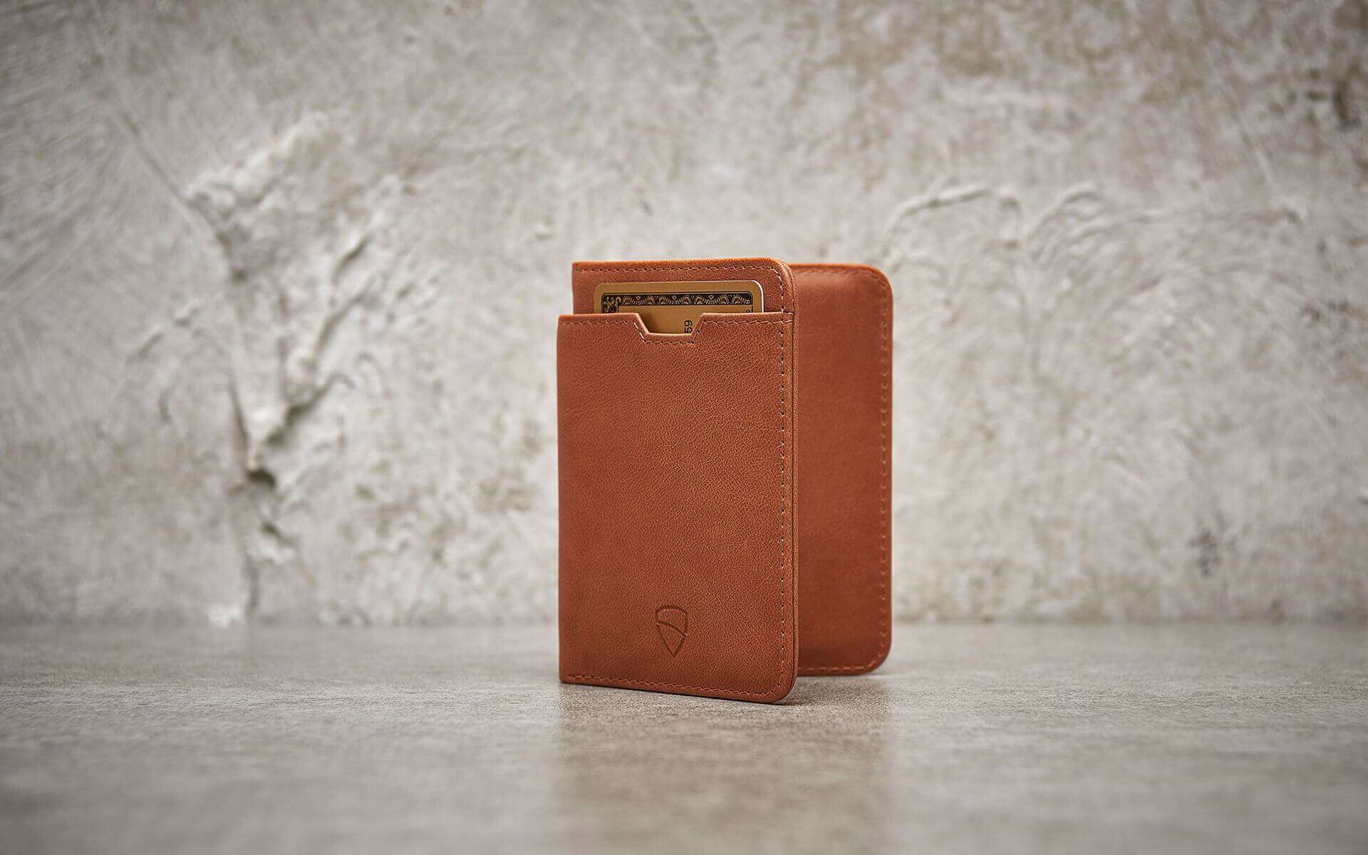 CITY Wallet made of luxurious Italian leather, featuring a slim design and RFID-blocking technology, perfect for secure card storage.