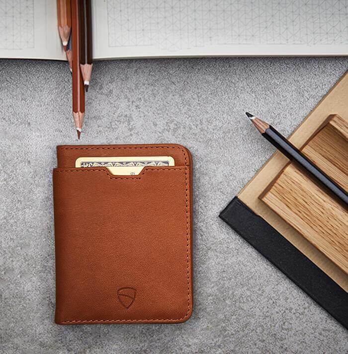 CITY Wallet made of luxurious Italian leather, featuring a slim design and RFID-blocking technology, perfect for secure card storage.