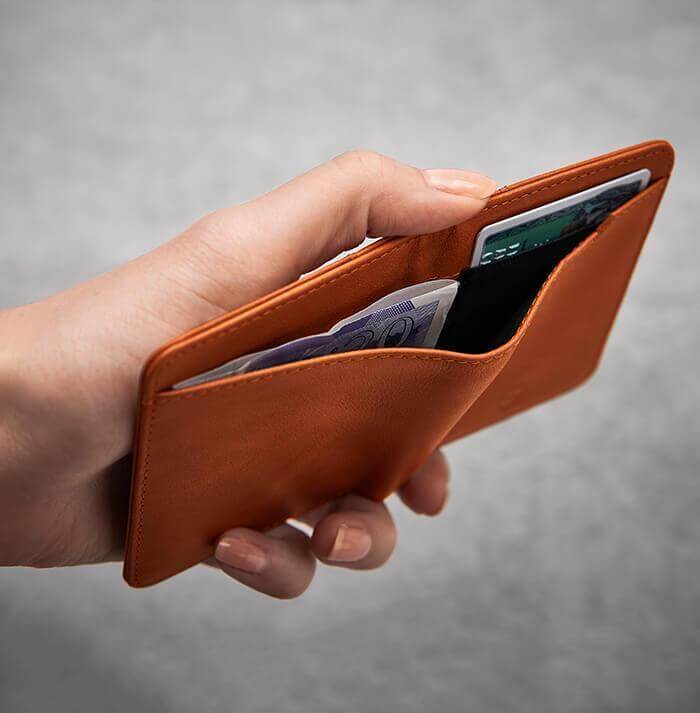 CITY Wallet made of luxurious Italian leather, featuring a slim design and RFID-blocking technology, perfect for secure card storage.
