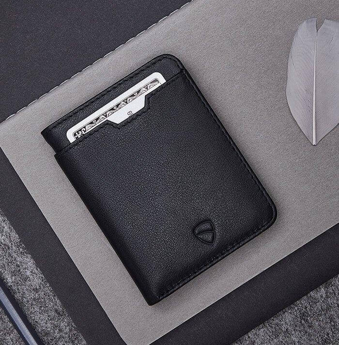 CITY Wallet made of luxurious Italian leather, featuring a slim design and RFID-blocking technology, perfect for secure card storage.