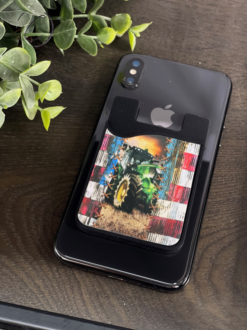 Farmer Card Caddy Phone Wallet in silicone, holding cards and featuring a microfiber screen cleaner.