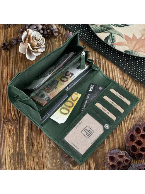 Natural leather women's wallet in red, green, and orange with geometric embossed pattern and compartments for cards and cash.