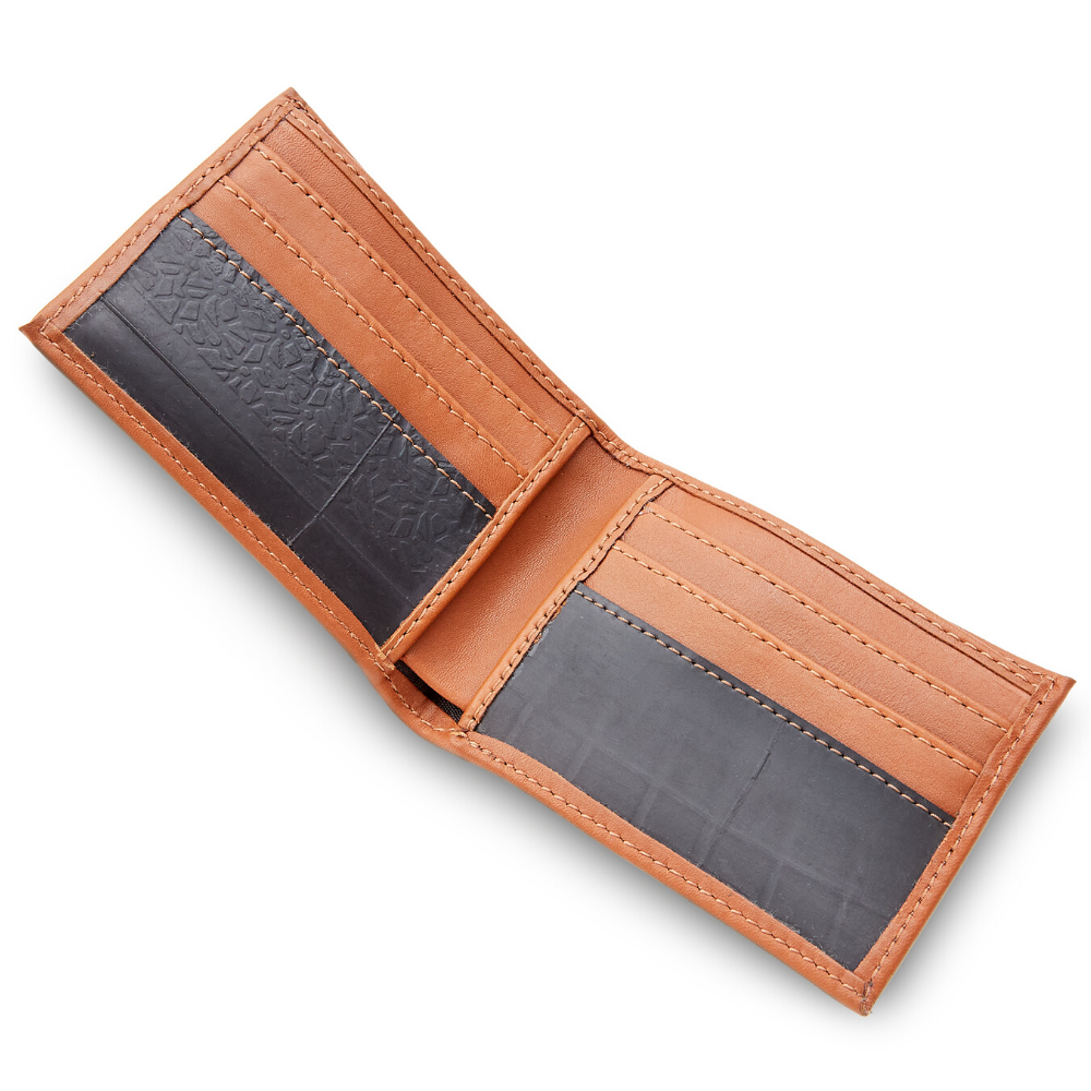 The Michel Bifold Leather Wallet showcasing its minimalist design, made from locally sourced leather and featuring recycled tire tube pockets.