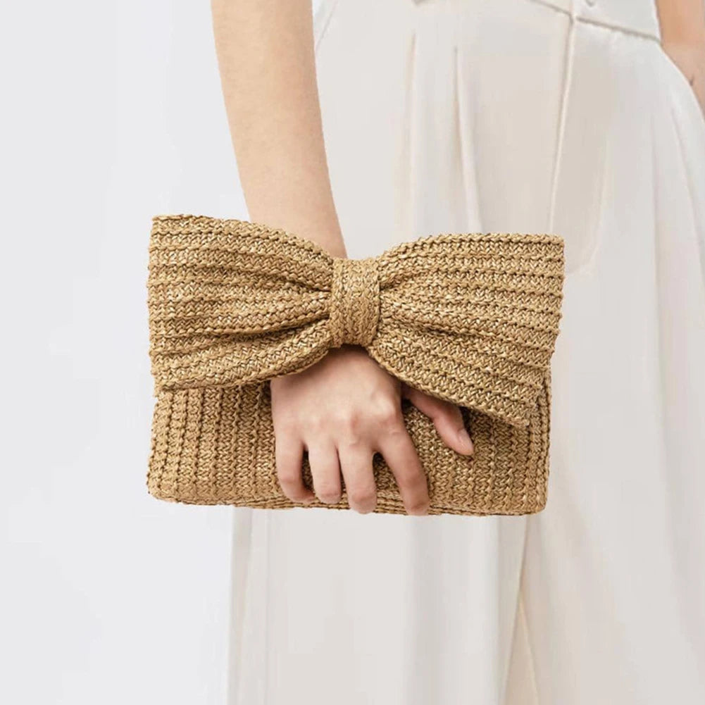 Women Bow Purse from Sexikinis, featuring a stylish straw design, unique pillow shape, and elegant bow decoration.