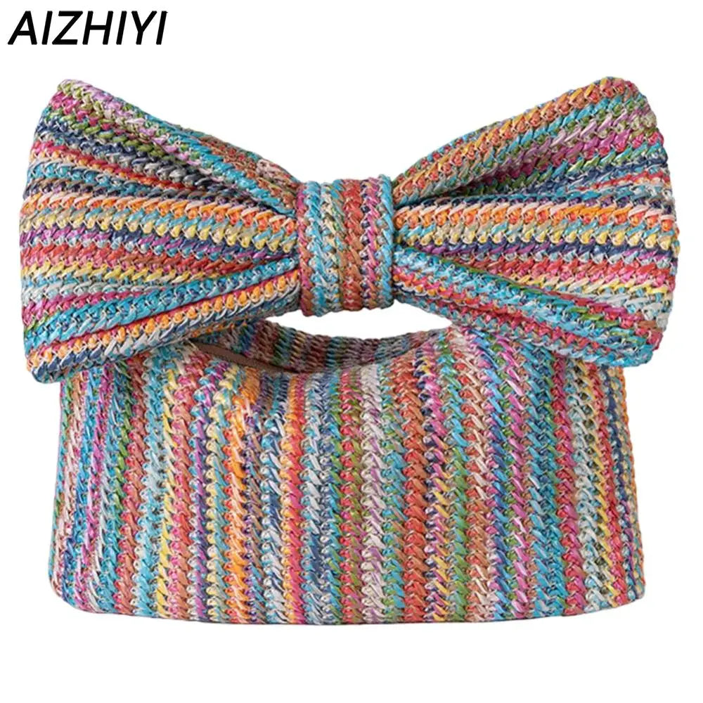 Women Bow Purse from Sexikinis, featuring a stylish straw design, unique pillow shape, and elegant bow decoration.