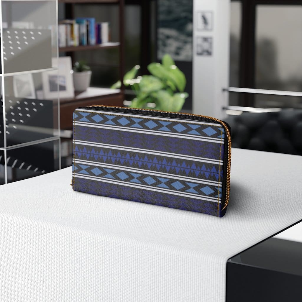 Stylish blue geometric Aztec zip wallet for women, featuring multiple pockets and a durable design.
