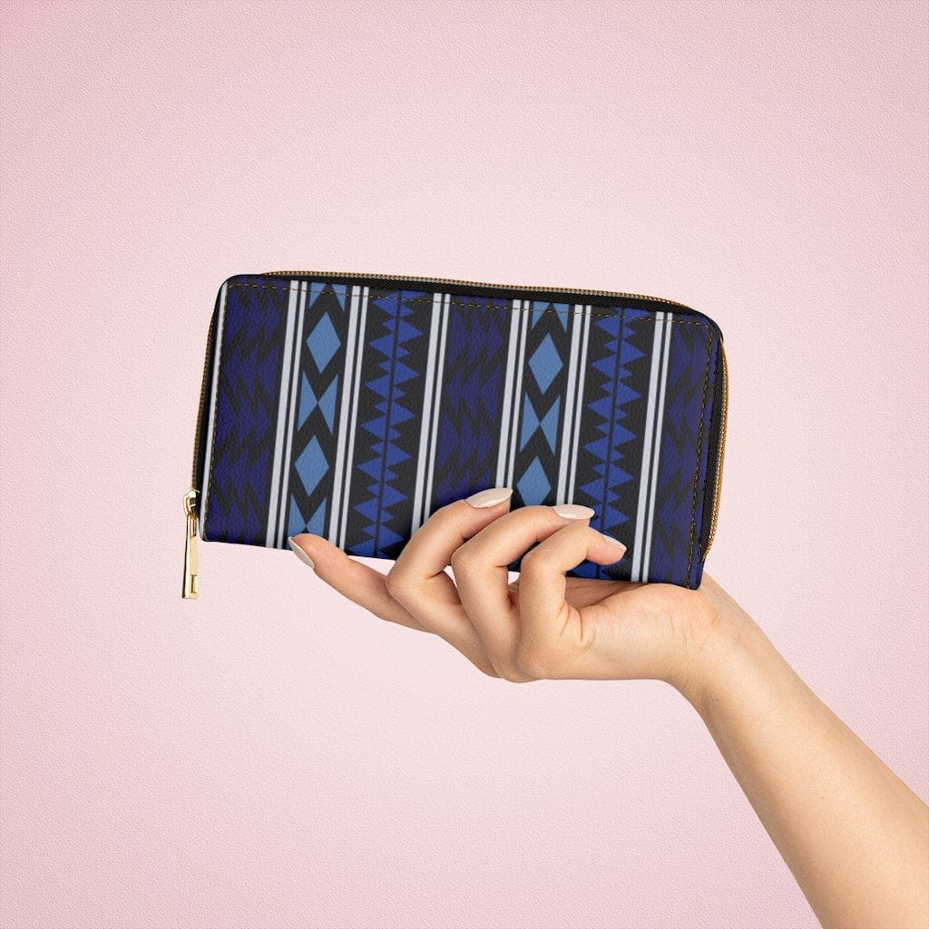 Stylish blue geometric Aztec zip wallet for women, featuring cruelty-free faux leather and durable hardware.