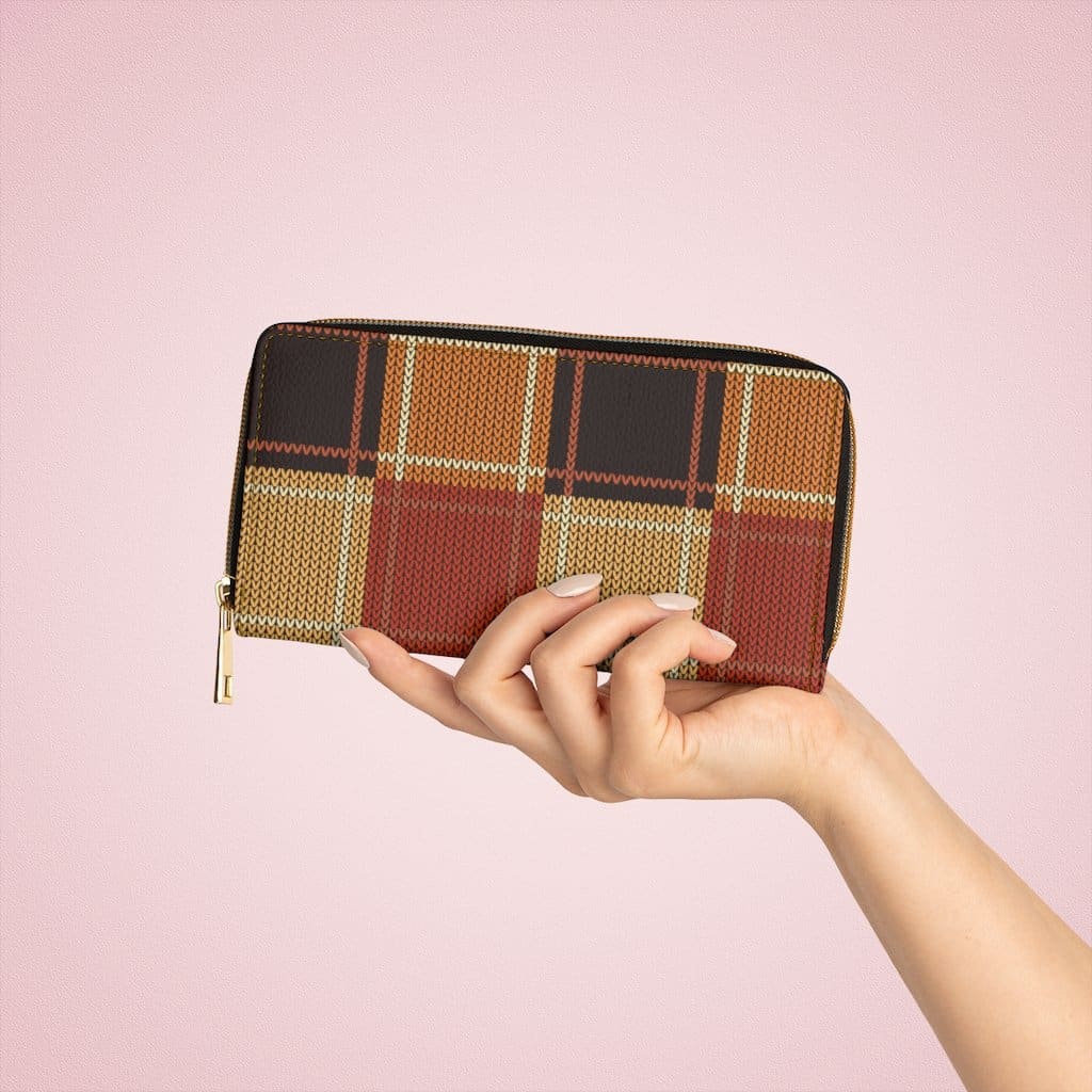 Brown colorblock women's zip wallet made from faux leather with gold stitching and multiple pockets.