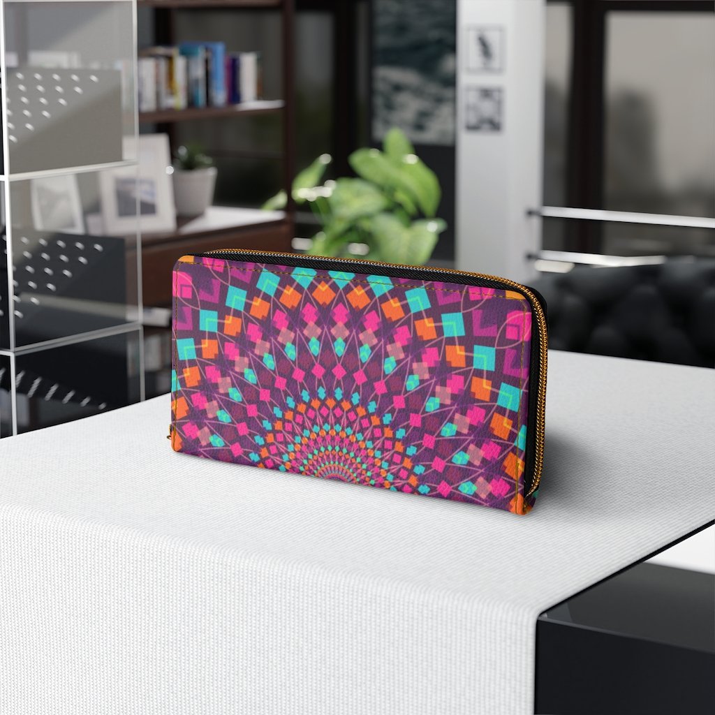 Purple kaleidoscope zip wallet for women, featuring cruelty-free faux leather and gold stitching.