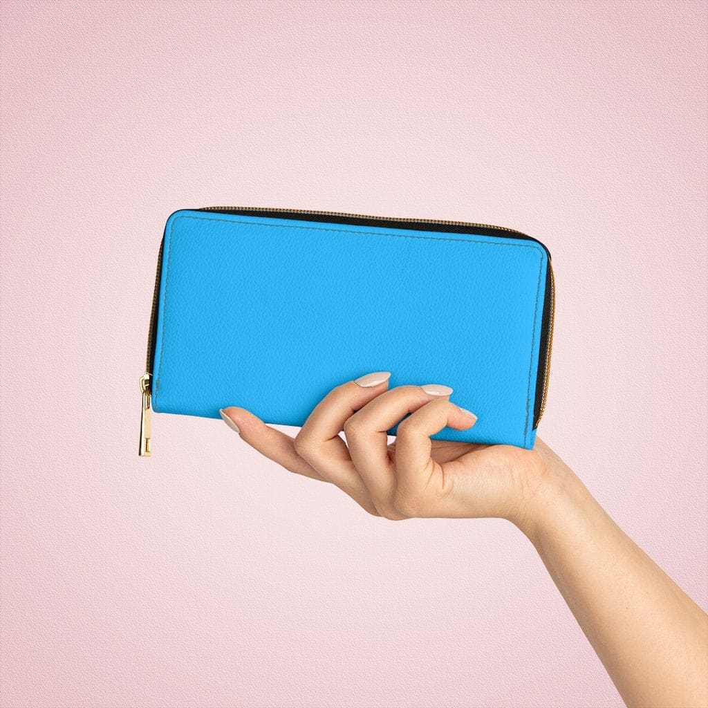 A vibrant blue women's zip wallet made of faux leather, featuring gold stitching and multiple pockets for cards and cash.