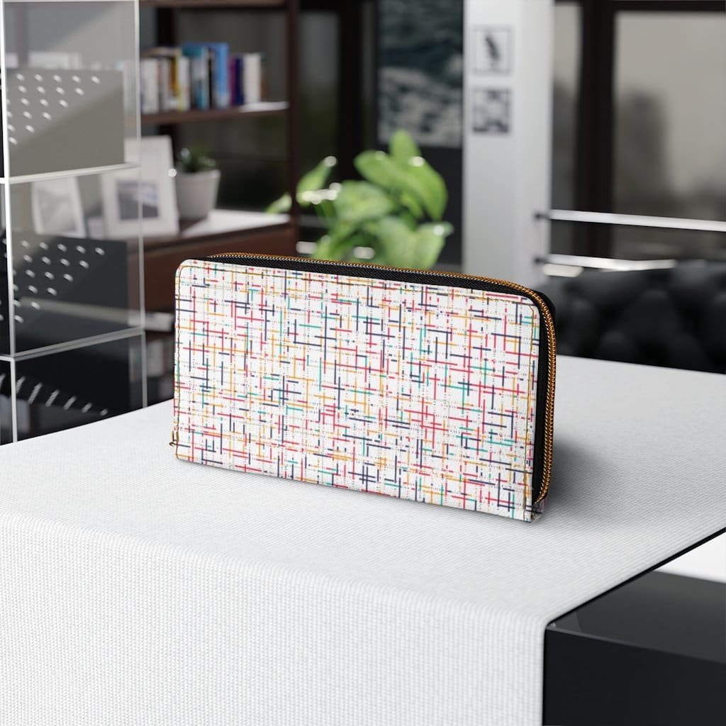 Stylish women's zip wallet in white multicolor pinstripe with gold stitching and durable zip closure.