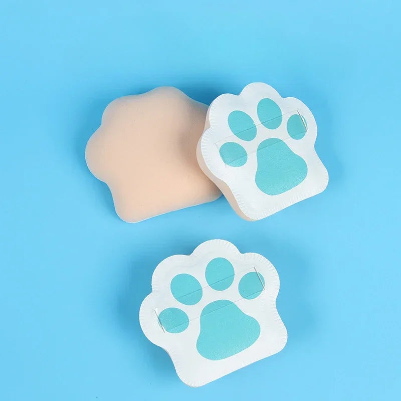 Three cute cat claw makeup sponges in pastel colors, designed for applying foundation and powder.