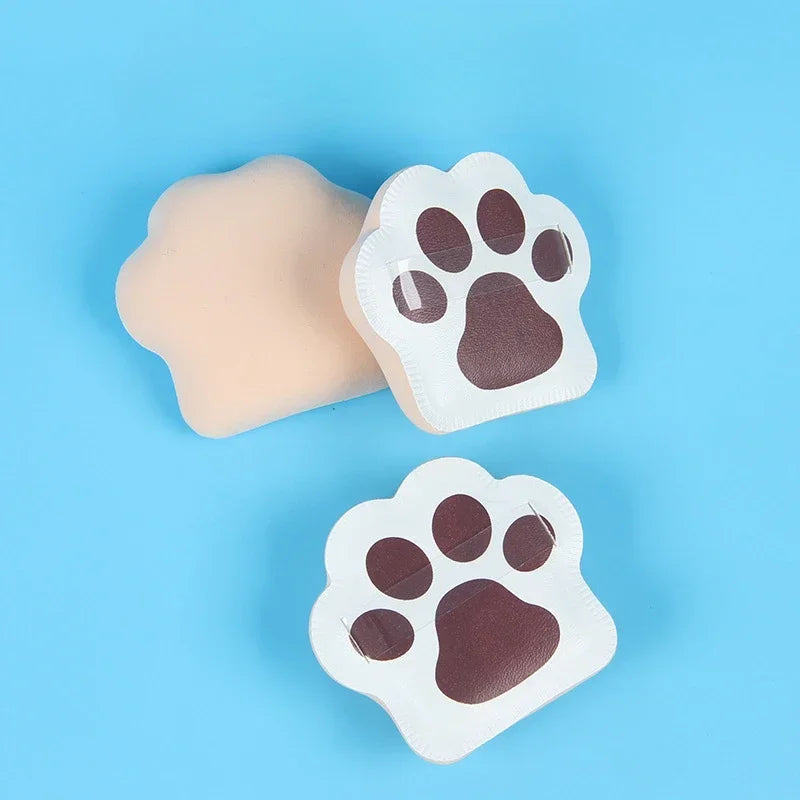 Three cute cat claw makeup sponges in pastel colors, designed for applying foundation and powder.