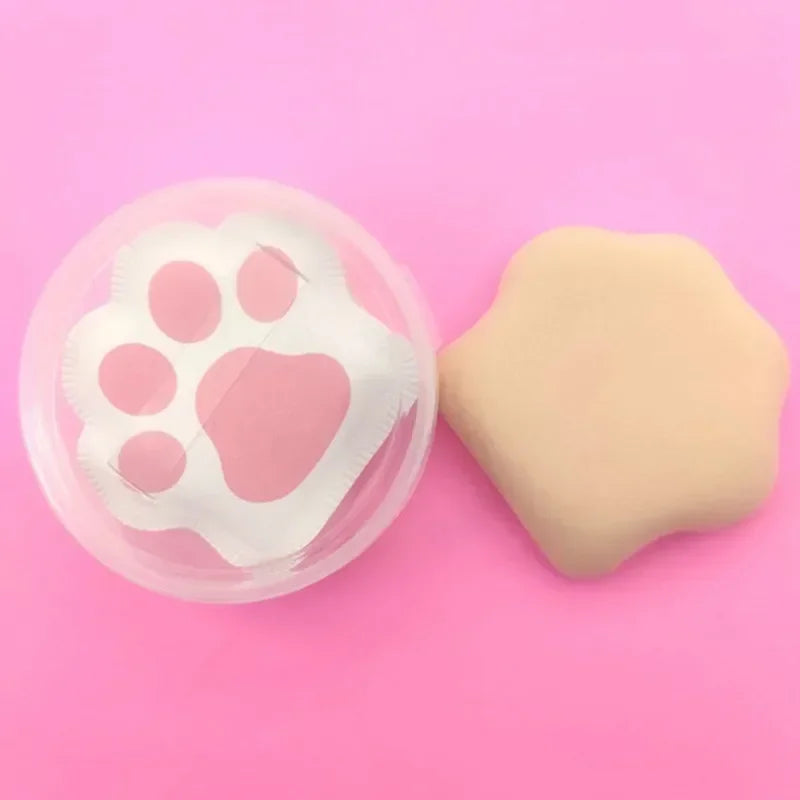 Three cute cat claw makeup sponges in pastel colors, designed for applying foundation and powder.