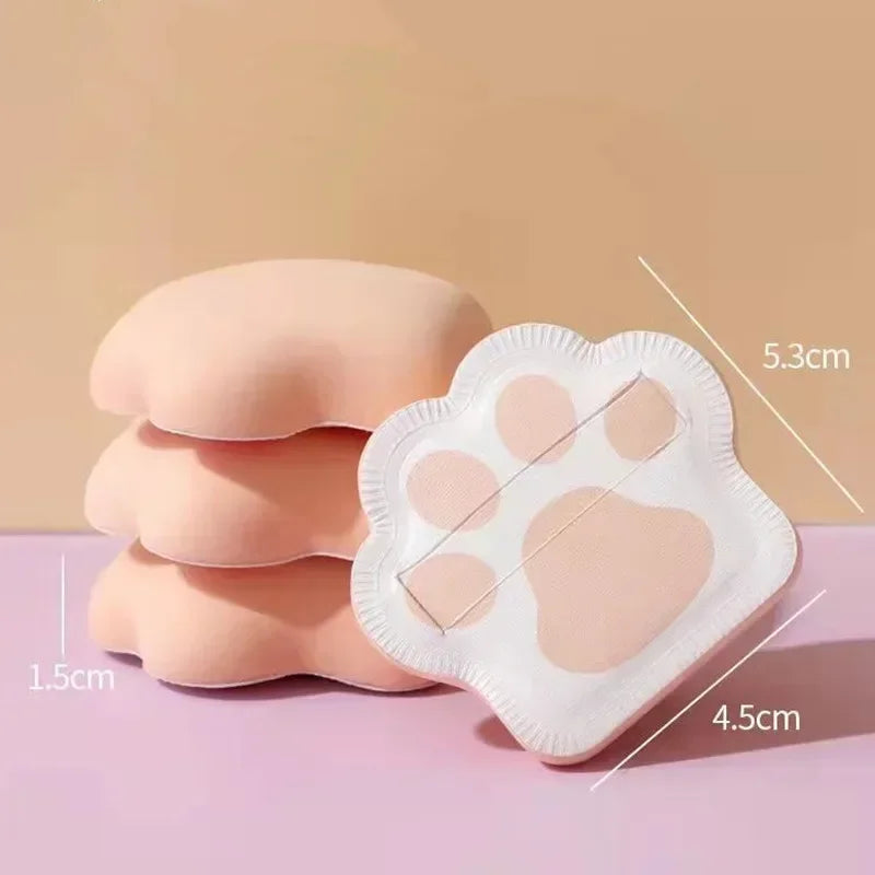 Three cute cat claw makeup sponges in pastel colors, designed for applying foundation and powder.