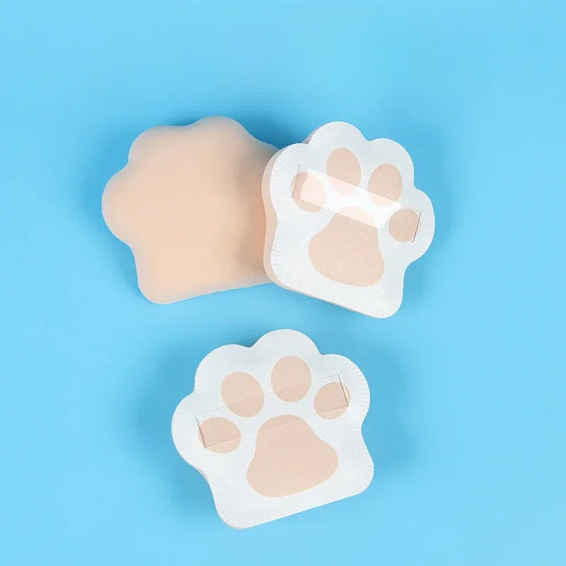 Three cute cat claw makeup sponges in pastel colors, designed for applying foundation and powder.