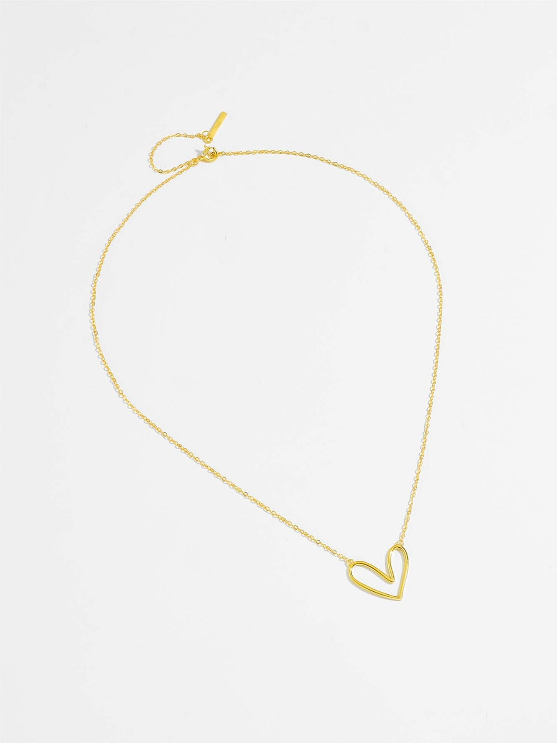 A delicate 925 sterling silver heart pendant necklace with a platinum and 18K gold plating, showcasing its elegant design.