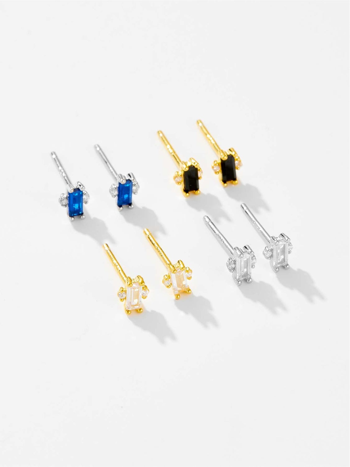 A pair of elegant 925 sterling silver stud earrings featuring sparkling zircon stones, showcasing their luxurious design and quality craftsmanship.