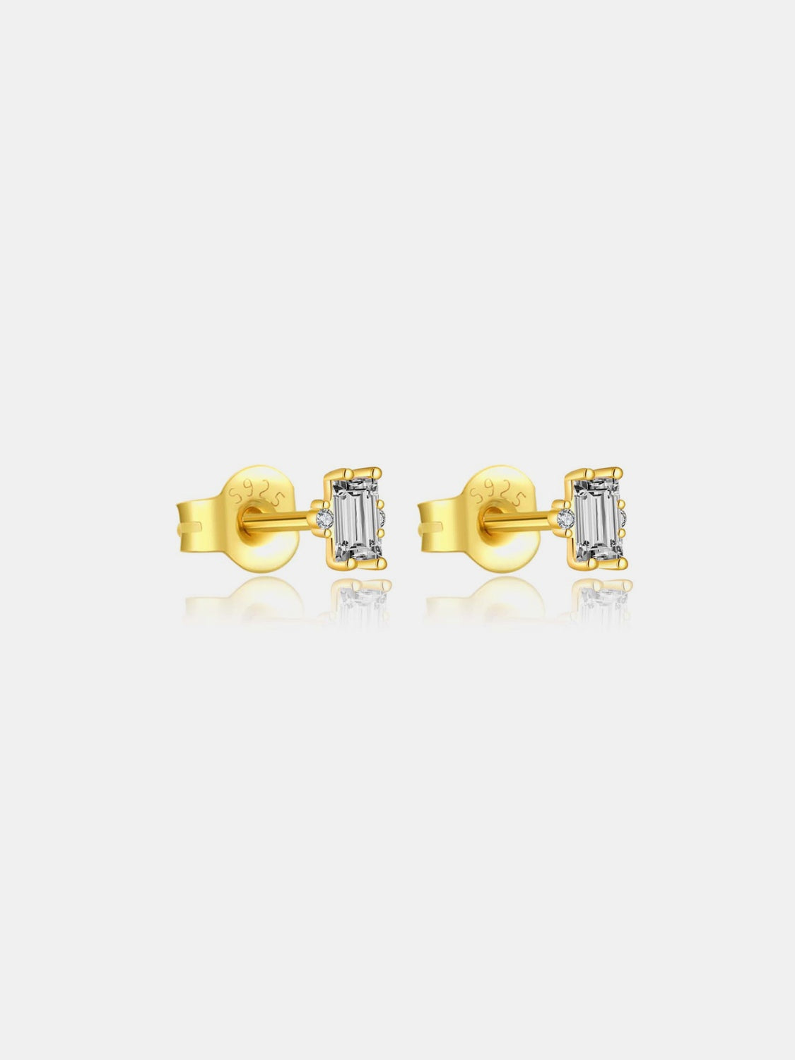 A pair of elegant 925 sterling silver stud earrings featuring sparkling zircon stones, showcasing their luxurious design and quality craftsmanship.