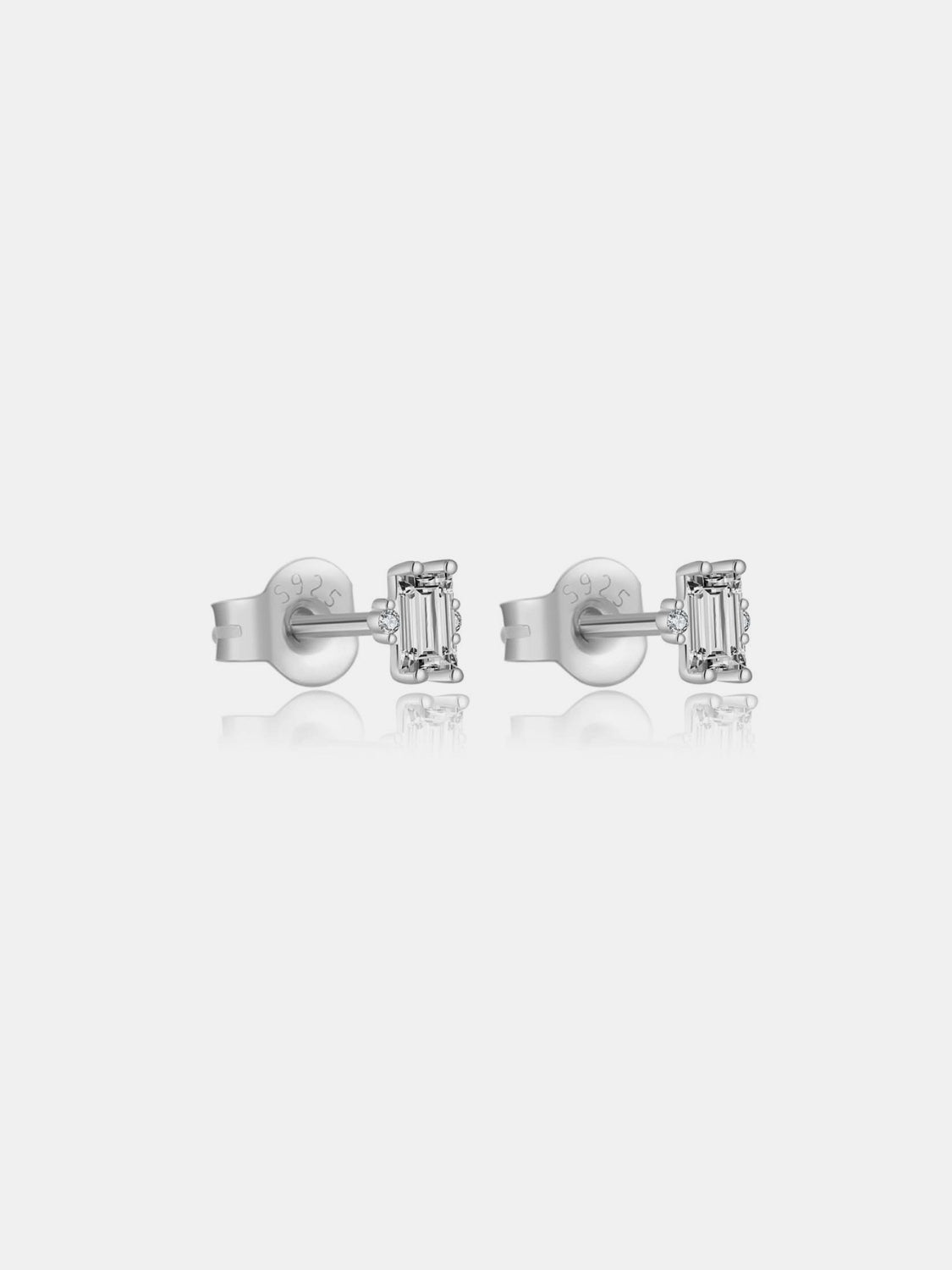 A pair of elegant 925 sterling silver stud earrings featuring sparkling zircon stones, showcasing their luxurious design and quality craftsmanship.
