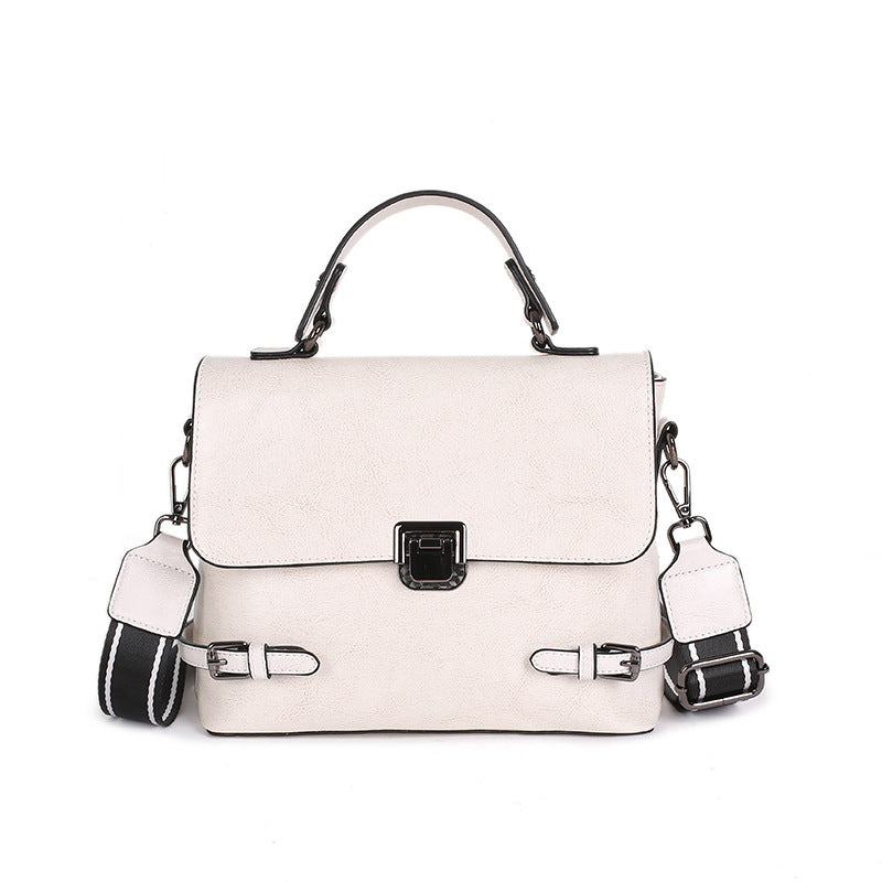 All-Match Leather Urban Simplicity Messenger Bag for Ladies, crafted from first layer cowhide, featuring a detachable handle and multiple pockets.