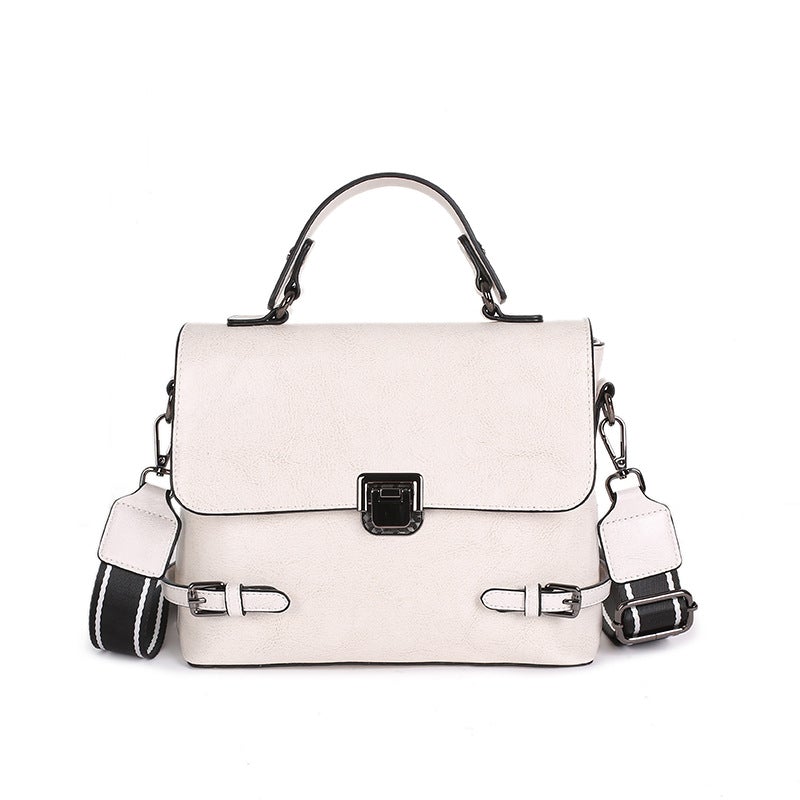 All-Match Leather Urban Simplicity Messenger Bag for Ladies, crafted from first layer cowhide, featuring a detachable handle and multiple pockets.