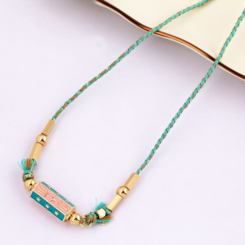 Amour Turkish Amulet Necklace featuring a trendy geometric design in copper with a box chain.