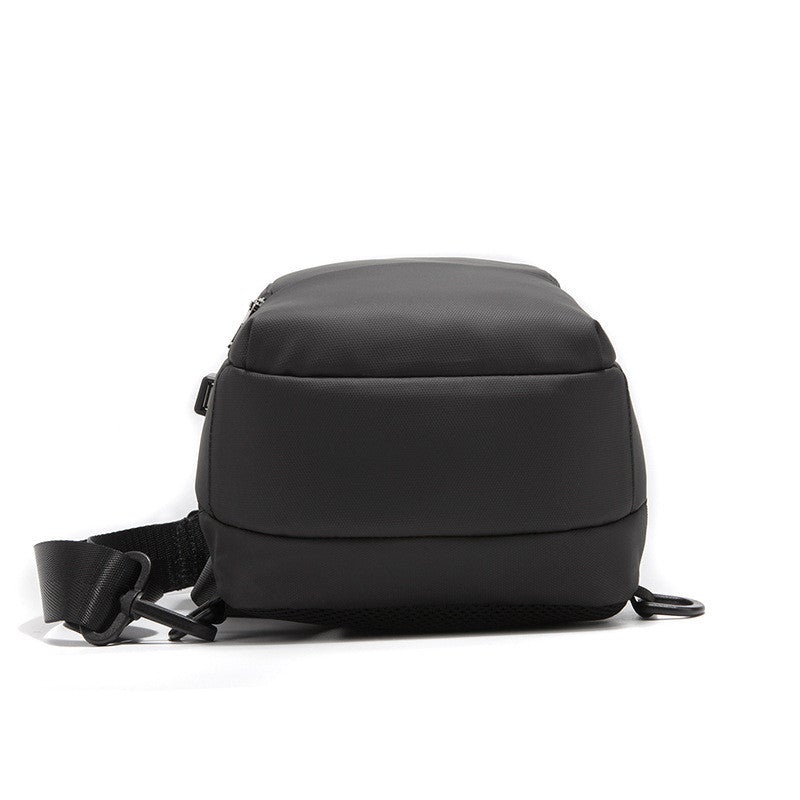 Anti-theft crossbody bag for men featuring a USB charging port, made from waterproof Polyamide fiber with multiple pockets.