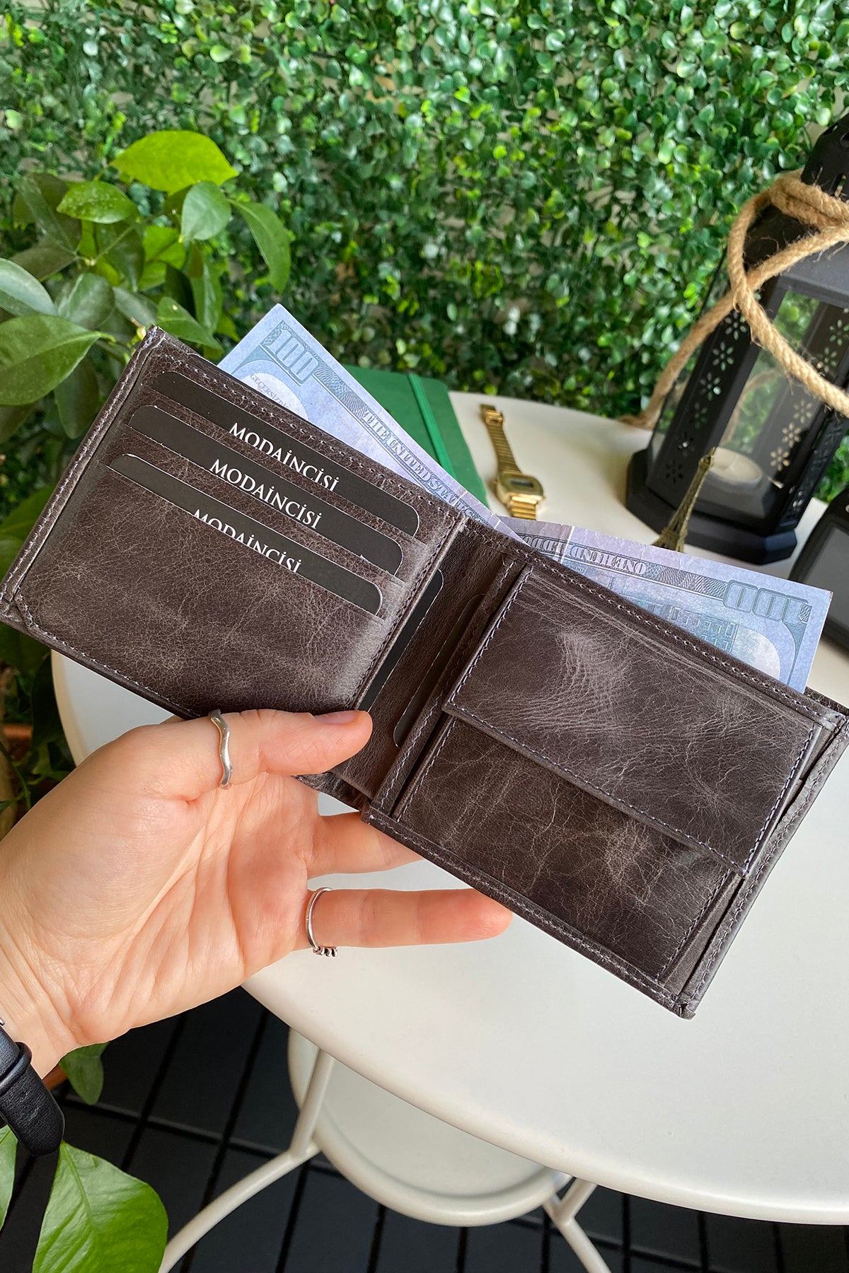 Atlanta Genuine Leather Trifold Wallet in various colors with coin pouch compartment, showcasing its sleek design and high-quality leather.
