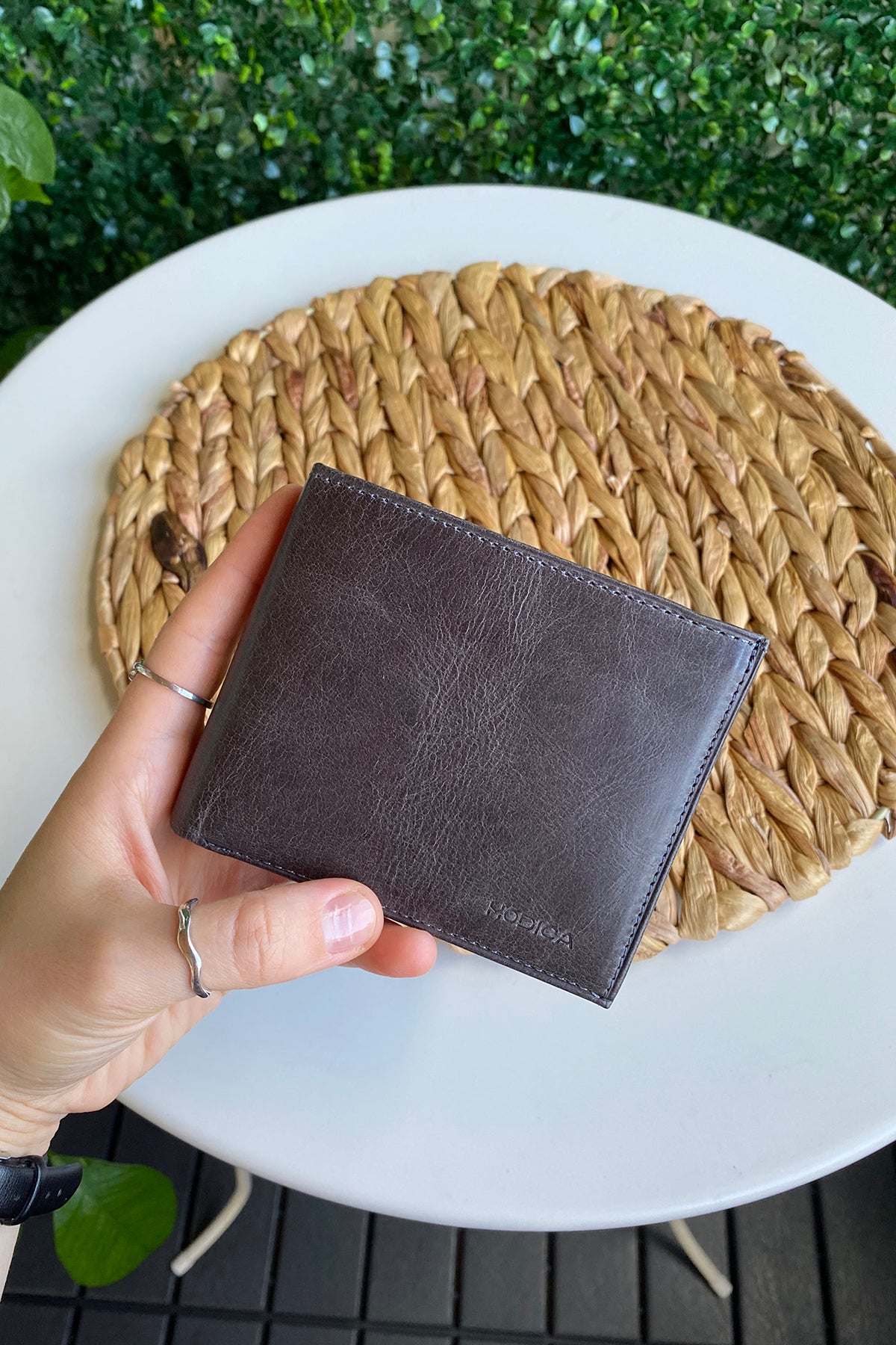 Atlanta Genuine Leather Trifold Wallet in various colors with coin pouch compartment, showcasing its sleek design and high-quality leather.