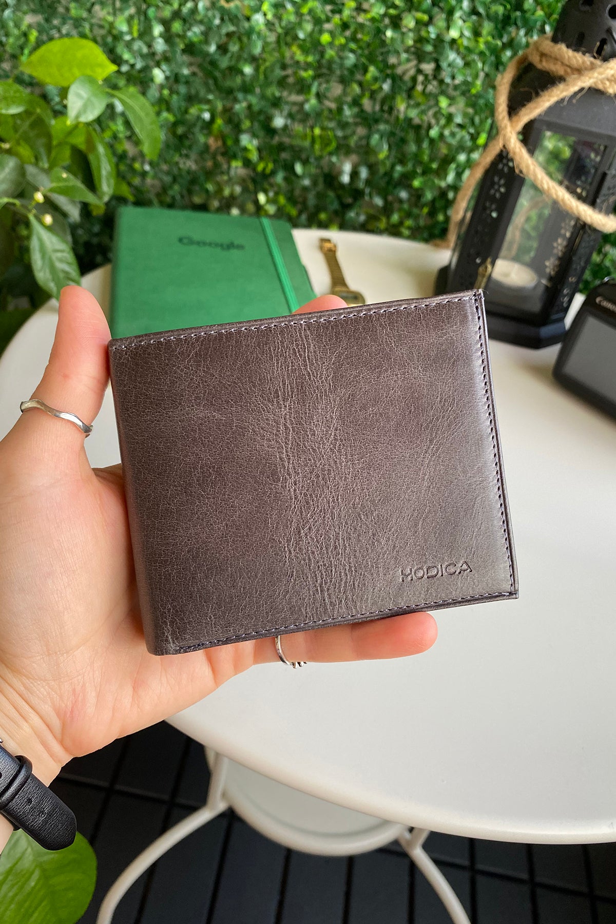 Atlanta Genuine Leather Trifold Wallet in various colors with coin pouch compartment, showcasing its sleek design and high-quality leather.