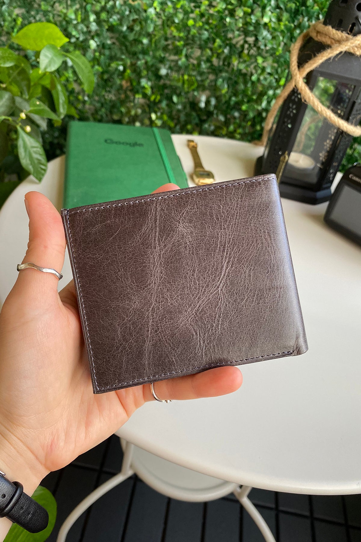 Atlanta Genuine Leather Trifold Wallet in various colors with coin pouch compartment, showcasing its sleek design and high-quality leather.